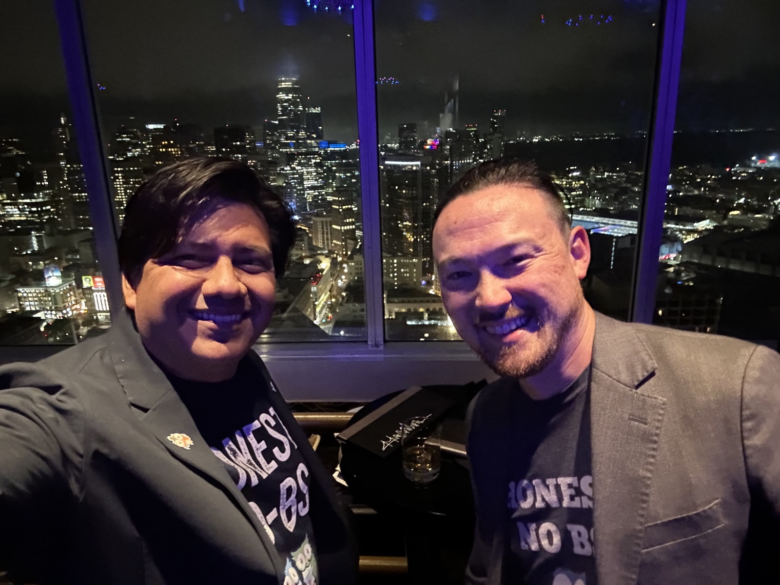 The hosts of the Catalog & Cocktails podcast